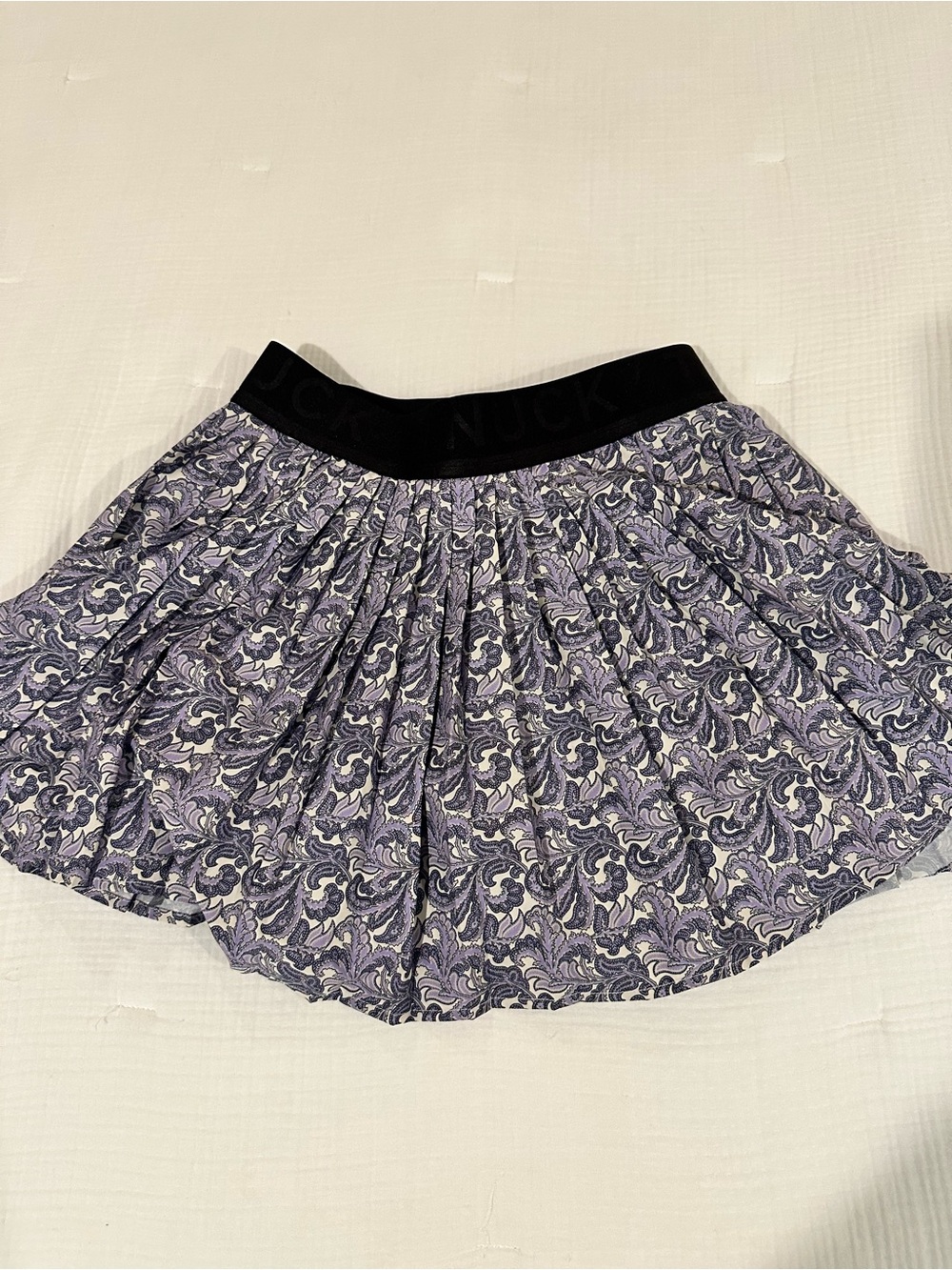 Tuckernuck Pleated Athleisure Floral Print Mini Skirt in Lavender